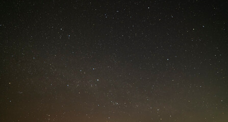 Beautiful winter dark starry sky. Night photography, astronomical background.