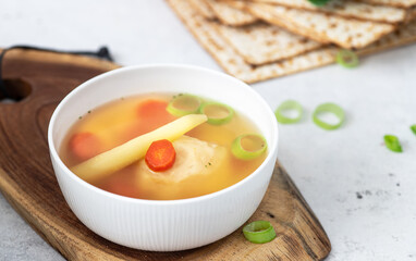 Vegetable soup with matzo bread. Passover food