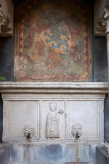Brescia, Italy - August 22, 2020 : Old fountain, called Fontana Tagliaferri,  in Piazza Tito Speri