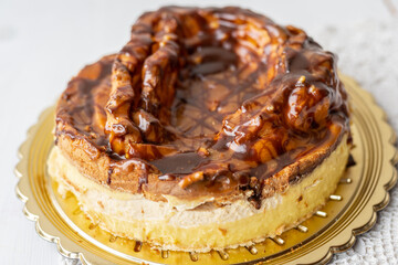 giant extra large chocolate caramel vanilla custard cream profiterole cake