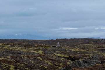 Fototapeta na wymiar Measuring device for recording earth movements and seismic activity in the Hvassahraun lava field on the Icelandic peninsula of Reykjanes. 