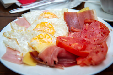 Montenegrin fried breakfast on a restaurant table,Kotor,Montenegro.