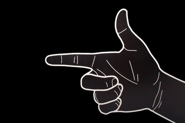 pointing hand isolated on a black background