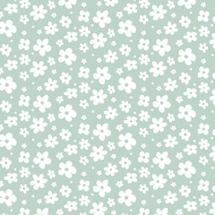 White flowers on green background