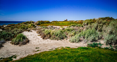 Hole on the Peninsula Golf Course in Puerto Penasco, Sonora, Mexico on a beautiful winter day with the Sea of Cortez in the background