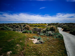 Hole on the Peninsula Golf Course near the Mayan Hotel in Puerto Penasco, Sonora, Mexico on a beautiful winter day with the Sea of Cortez in the background
