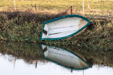 row boat at riverside