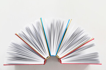 Stack of books on white background