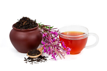 Cup of herbal tea, clay pot with dry tea and blooming Chamerion angustifolium (common names: fireweed, great willowherb, rosebay willowherb) plant isolated on a white background.