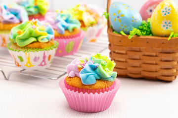 Pastel Rainbow Frosted Easter Cupcakes  on a Kitchen Counter