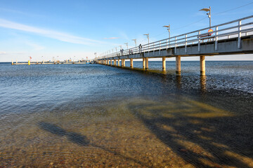 Fototapeta premium Pier in Mechelinki. Mechelinki is a fishing village and a popular tourist destination on the Baltic Sea in Poland