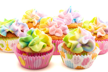 Pastel Rainbow Frosted Easter Cupcakes  on a White Background
