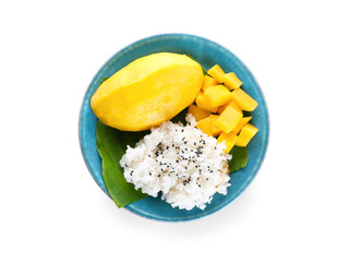 Plate with tasty rice and mango  on white background