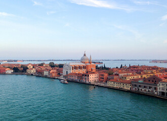 Fototapeta na wymiar View of the magnificent city of Venice from aboard a cruise ship crossing the Grand Canal