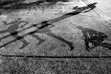 Detail of mosaic at the Stadio dei Marmi in Rome. Shadow play. Black and white photo