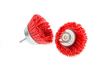 Angle grinder polishing red brushes isolated on white background