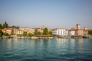 Obraz premium Sirmione. View of the marina and the town on Lake Gardaa. Lombardy, Italy