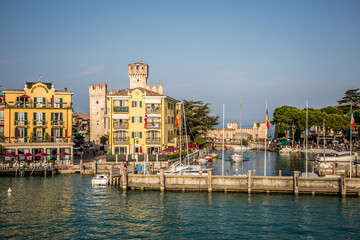 Fototapeta premium Sirmione. View of the marina and the town on Lake Gardaa. Lombardy, Italy