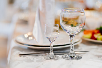 empty glasses on a table served for the holiday. 