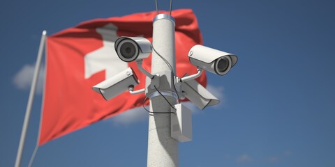 Naklejka na ściany i meble Outdoor security cameras near flag of Switzerland. 3d rendering