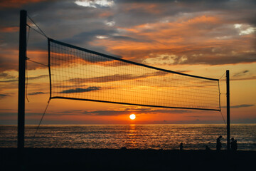 Obraz premium Volleyball Net On The Seabeach At Sunset