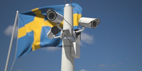 Naklejka na ściany i meble Waving flag of Sweden and the security cameras on the pole. 3d rendering