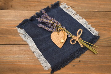 heart and lavender bouquet on a wooden table
