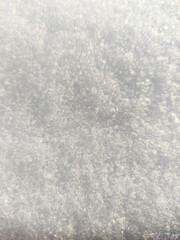 background of fresh snow texture in gray tones