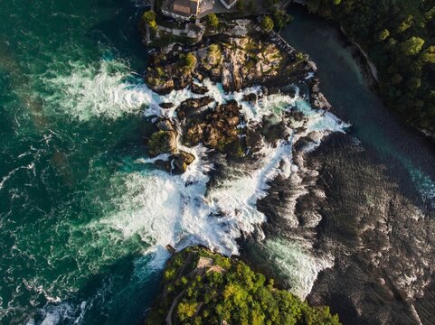 Aerial top down panorama of Rheinfall cascade rapid waterfall on Rhine river Neuhausen Schaffhausen Switzerland Germany