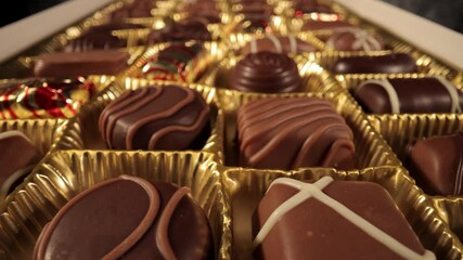 A box of chocolates pralines in close-up view - food photography