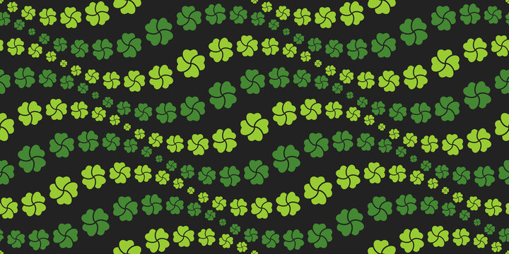 Seamless pattern. Tiled green shamrock images. Light green heart shapes with black background. Wavy texture. Graphic pattern for fabric, textile, wallpaper, packaging, gift.