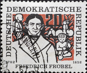 GERMANY, DDR - CIRCA 1957 : a postage stamp from Germany, GDR showing a portrait of the pedagogue...