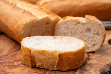 Ingredient for French breakfast, fresh baked crispy baguette white bread