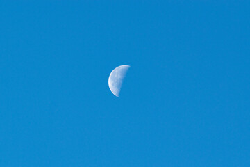 Moon in blue sky 