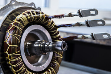 Partially disassembled for repair IPM-SynRM (Internal Permanent Magnet Synchronous Reluctance Motor) motor of an moder electric vehicle. - obrazy, fototapety, plakaty