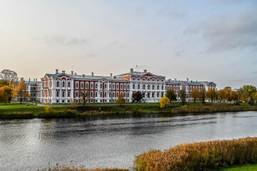 City palace reflects in river.