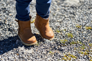Child feet in boots