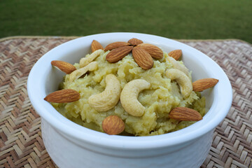 Shakarkandi or Shakarkand a root vegetable sweet dish from Gujarat India home cooked during upawas or vrat ka khana. For mahashivratri, ekadashi garnished with dryfruits decorated. Sweetpotato dessert