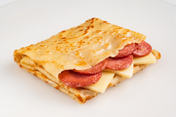 pancake stuffed with sausage and cheese,