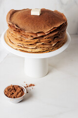 Chocolate ombre pancakes, Crepe cake on a cake stand