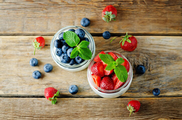Greek yogurt strawberry and blueberry parfaits with fresh berries