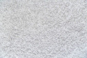 Abstract white background. Rough texture. Plaster on the wall