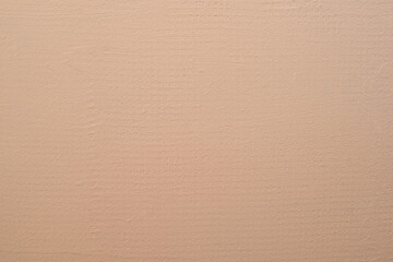 Colored peach wall. Texture. Background.