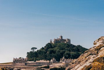  St Michaels Mount in Cornwall Britain. At low tide, the island can be reach by foot from Marazion town by a man-made causeway.