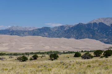 Great Sand Dunes National Park, Colorado, USA. Beautiful scenic majestic sand dunes. Travel destination location for camping, hiking, relaxing and enjoying natures beauty.