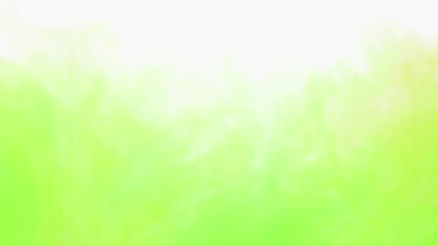 Yellow and green ink spreading in water on white. Abstract color background, liquid smoke, psychedelic and art concept.