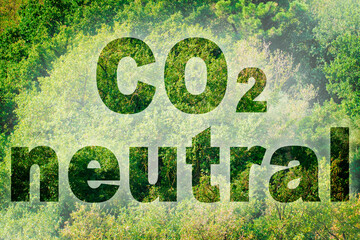CO2 Neutral text - concept image against a forest backgound
