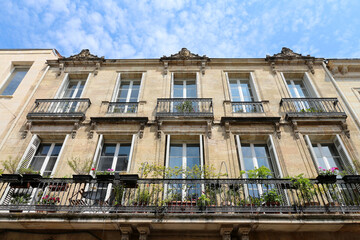 Fototapeta na wymiar Blacony on classical building- Bordeaux (France)