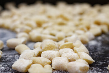 raw dough to make gnocchi, raw gnocchi, homemade gnocchi with flour