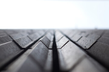 Abstract shot of a concrete wall with sharp lines, edges and short area of focus